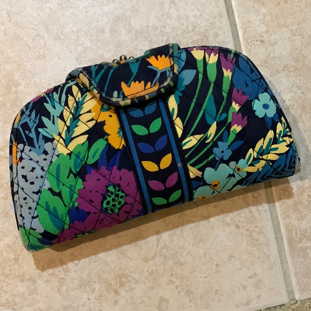 Vera Bradley wallet. Multiple card slots and pockets. Magnetic closure.